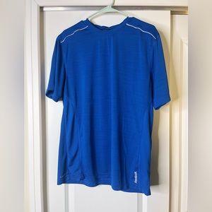 Reebok - great condition - men’s blue lg basketball tshirt